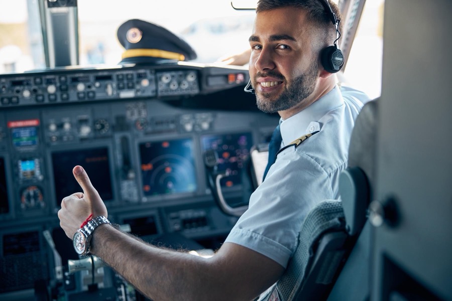 Young first officer settled into the flight deck before departure